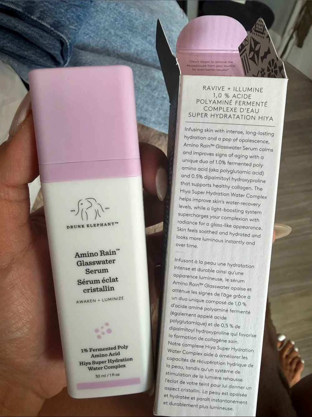 Drunk Elephant Amino Rain Glasswater Serum - Cream with Purple Accents